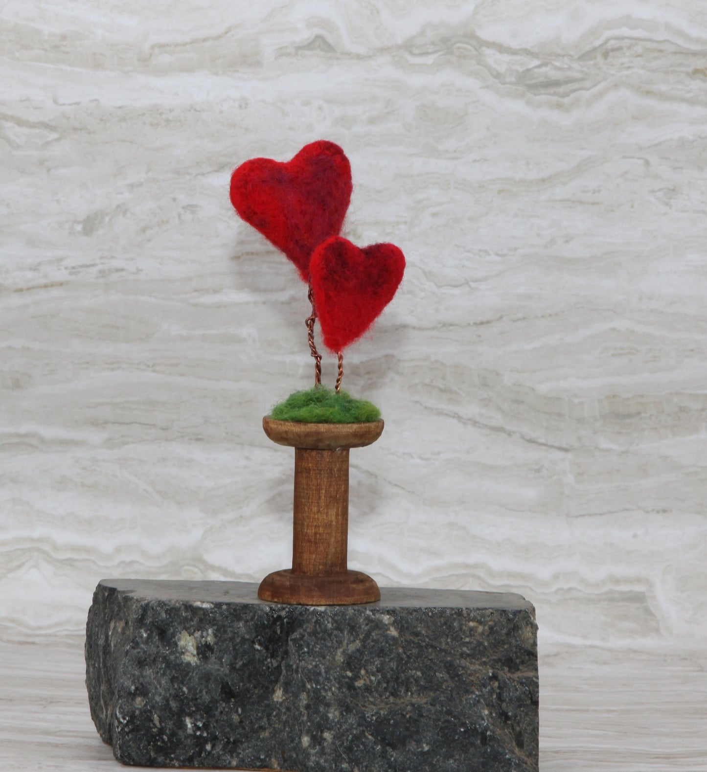 Felted hearts duo on bobbin