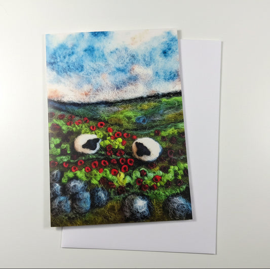 Greeting card with a nature-themed design on a wooden surface with lavender.