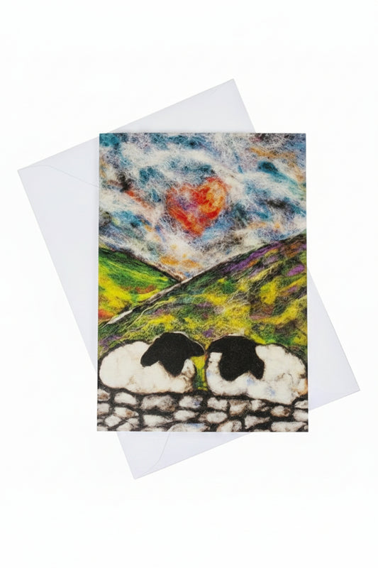 A square greeting card featuring a textured, folk-art style landscape with sheep on a stone wall under a cloudy sky 
